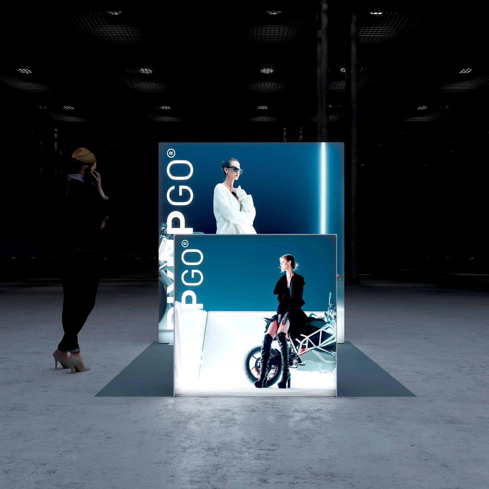 PIXLIP GO Messestand mit hinterleuchteter LED Rückwand und beleuchtetem Counter, modernes Standdesign mit Sitzplatz