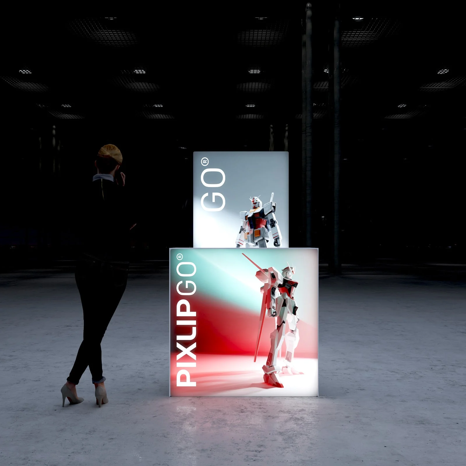 PIXLIP GO Messestand mit hinterleuchteter LED Rückwand und beleuchtetem Counter, modernes Standdesign mit Sitzmöglichkeit