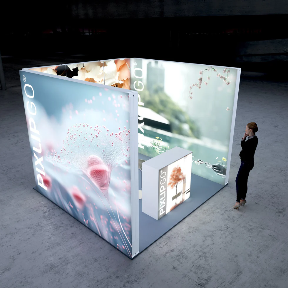 PIXLIP GO LED Messesystem mit drei Leuchtwänden und Counter aus der Vogelperspektive, modularer Messestand für professionelle Präsentationen
